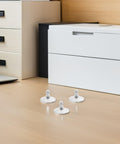 Heavy Duty Adjustable Furniture Leveling Feet on desk, silver swivel base for stable couches and cabinets.