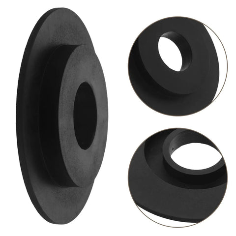 Close-up of black plastic wheel balancer guard panel with drive belt cover for tire balancing equipment