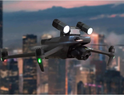 Drone flying over city at dusk with T30 Spotlight Kit For Mavic 3 Enterprise Drones 3E 3T SDK Ready Mount Replacement Accessory Durable Build.