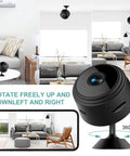 Mini Hidden Camera 1080P HD WiFi Security Cam For Baby And Pet Monitoring Nanny Cam For Home Indoor Outdoor Surveillance With App Remote Viewing And 150 Degree Wide Angle Easy Setup, shown in living room with smartphone view.