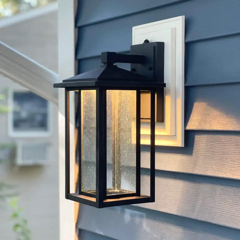 Side view of Seeded Glass Outdoor Wall Light With Dusk To Dawn Sensor, 1000 Lumens Of Warm 3000K Glow, 15.5 Inch Tall Porch Lantern