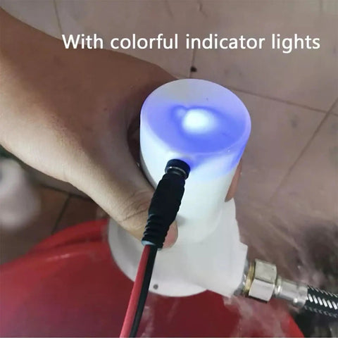 Hand holding 50W Portable Micro Hydroelectric Turbine Generator For Tap Water And Streams with indicator lights and cable connected.