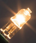 Close-up of glowing 10 Pack 12V G4 Bi Pin Halogen Bulbs T3 10W 120Lm Dimmable Warm White 2700K Eco Halogen in use