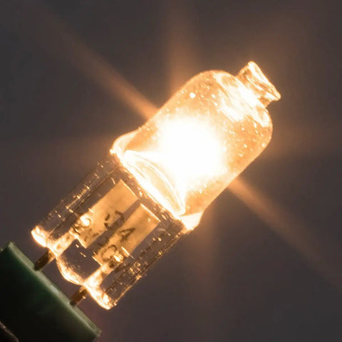 Close-up of glowing 10 Pack 12V G4 Bi Pin Halogen Bulbs T3 10W 120Lm Dimmable Warm White 2700K Eco Halogen in use