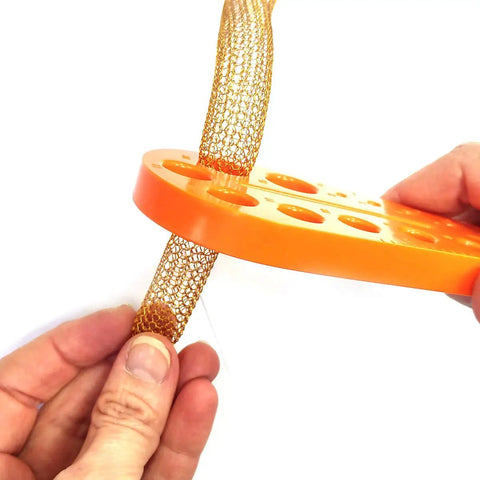 Hands using Go To Jewelry Making Kit For Beginners With A 7 Piece Wire Mesh Loom Set And Draw Plate