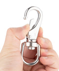 Front view of a 3-1/2 in stainless steel swivel eye snap hook held by a hand
