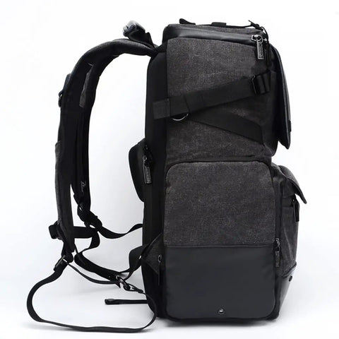 Side view of Big Capacity Laptop And DSLR Video Camera Backpack With All Weather Cover, showing padded straps and multiple zippers.