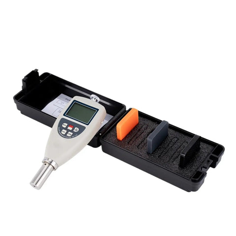 Straight Up Digital Shore Hardness Tester For Rubber And Plastic Using A D E Scale Types To Drop Crisp Testing Numbers Fast Inside A Slick Zero Hassle Handheld Meter in a compact case with testing blocks.