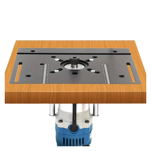 Top Notch Aluminum Router Table Insert Plate Featuring Crisp Measurement Scale And Rock Solid Flip Base For High Precision Woodworking Jobs Finished Off Nicely In Cool Sky Blue on a workbench.