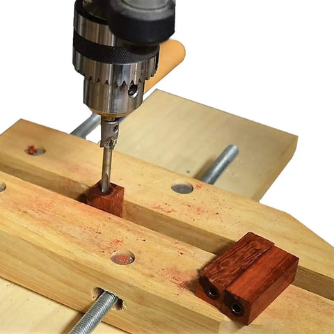 Drill mounted above wooden base with red wood block, demonstrating use of 7 Piece Pen Mill Trimmer Set Featuring Heavy Duty Steel Cutter And Multi Size Pilot Shafts For 7Mm 8Mm 10Mm Tubes.