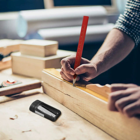 10 Piece Carpenter Pencil Set With 7 Inch Flat Octagonal Black Pencils Heavy Duty Woodworking Tools Includes Sharpener Eraser And Utility Knife Pro Grade Marking Kit For Contractors Carpenters And DIY Projects in use, showing precise wood marking with pencil and knife on a workbench.