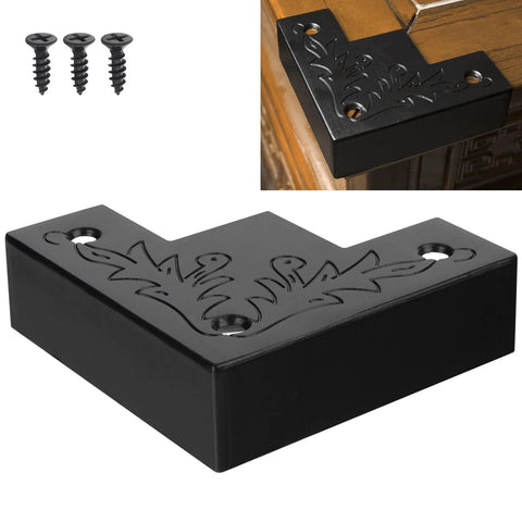 Black Metal Corner Protector 3.3 By 3.3 By 1 Inches For Wood Furniture And Doors 4 Pack Rust Resistant Zinc Alloy Edge Covers With Screws; shown installed on furniture corner.
