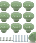 10 Pack Green Ceramic Cabinet Knobs 32mm Round Drawer Pulls with Screws for Kitchen Cabinets Wardrobes Kids Rooms Bedrooms and Office Desks Makeover Ready displayed in a grid with included screws
