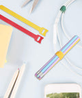 Ditch The Cord Chaos And Snag These Ridiculous 100 Piece Reusable Nylon Cable Ties Color Coded Wire Organizers For Zero Stress Tech Setup And Clean Workspace Storage with red and yellow ties.