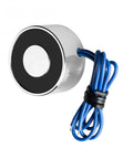 12V DC Electric Lifting Magnet Workhorse With 180N Peak Force Compact Solenoid Electromagnet For Lifting And Holding Small Parts 135N Holding Force Durable Iron Build 24 Cm Wire silver and black design with coiled blue wire