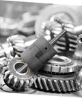 Heavy Duty Three Piece Jaw Coupler Kit Featuring Flexible Spider Insert connects servo motors, resting on metal gears.