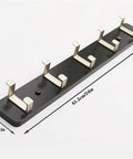 Slick Modern Wall Mounted Coat Rack In Brushed Brass With Heavy Duty Hooks For Entryway Living Room Or Kitchen To Hold Jackets Bags Hats And Umbrellas No Fuss Ever Durable Finish Looks Sharp While Sorting Daily Items Straight Up