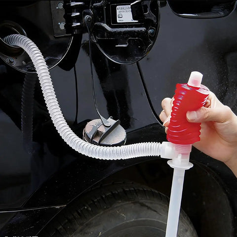 Heavy Duty Manual Hand Siphon Pump, High Flow Portable Fuel Extraction Hose For Gasoline Diesel And Motor Oil in use with vehicle.