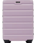 Wrangler 22-inch lilac hardside spinner carry-on luggage with four wheels