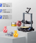 3D printer setup with Silk Copper PLA Filament 1.75mm, 1kg Spool showing vibrant prints
