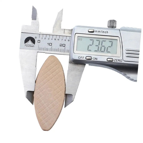 Caliper measuring biscuit plate from Pro Grade Beechwood Woodworking Biscuit Joiner Kit With Tenon Tool For Tight Board Splicing