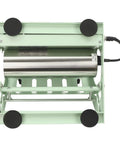 Top view of Two In One Tumbler Heat Press for 11 to 30-ounce mugs, showcasing the green metal frame and roller mechanism.