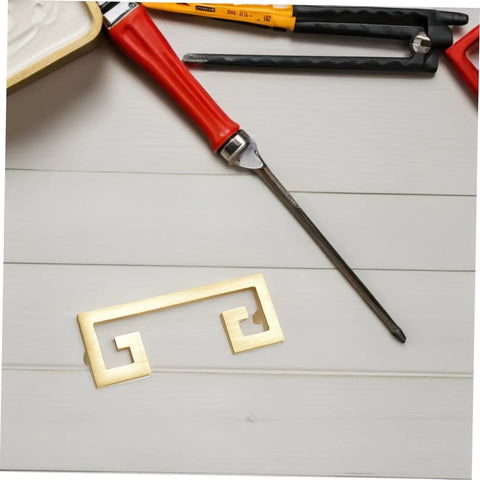 Gold Old School Vintage Style Zinc Alloy Cabinet Handle next to screwdriver on wood surface