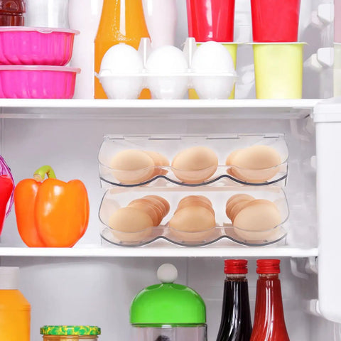 Clear Acrylic Stackable Egg Container For Refrigerator, 36 Count, in fridge with colorful items surrounding it.