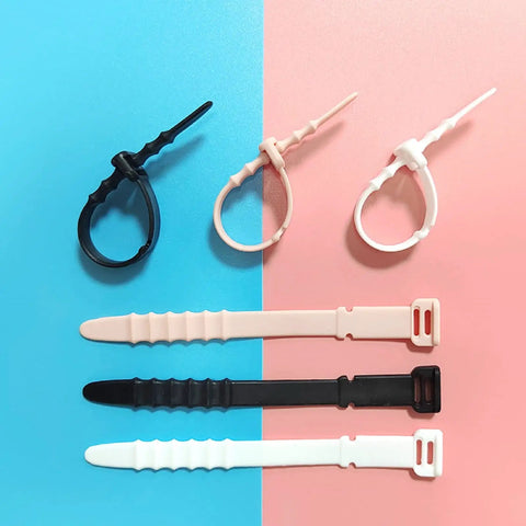 Reusable Silicone Zip Ties Set 20 Piece Cord Management Straps for Wires in Black White on two-tone background, 4.5 Inch
