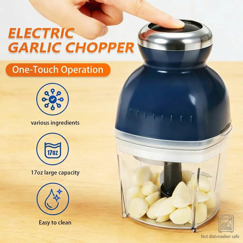 Brigii One Touch Electric Garlic Mincer And Onion Chopper 17oz Mini Food Processor with garlic cloves in clear bowl.
