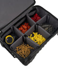 Open view of Pro Drop-Bottom Tool Bag with 15 compartments holding assorted fasteners and a measuring tape, waterproof bottom visible.