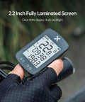 Gen2 GPS Bike Computer With Bluetooth, IPX7 Waterproof Build, 2.2 Inch LCD Cycling Console in a cyclist's hand, clear screen display.