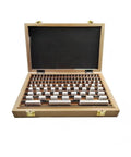 Pro Grade Ceramic Rectangular Gauge Block Set Boss Level Precision Calibration Kit For Micrometer And Caliper Inspection open wooden case displaying ceramic blocks.