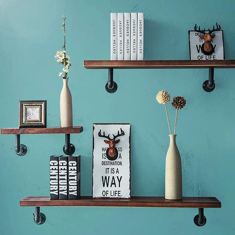 Beefy Iron Pipe Shelf Brackets For 7 To 14 Inch Boards, supporting floating shelves in industrial style, 6 pack in black.