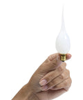 Silicone Dipped Candle Bulbs For Candle Lamps And Window Candles, 7 Watt Cozy Glow, E12 Candelabra Base, held in hand, close-up