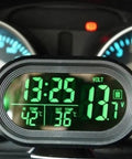 Front view of Shkalacar digital thermometer clock with green LED display showing time, dual temps, and volt on car dash