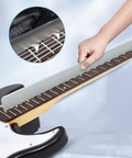 Upgrade Your Guitar Game With This Full 29 Piece Setup Kit Packed With A Sixteen Inch Fret Leveling Beam notched on guitar neck