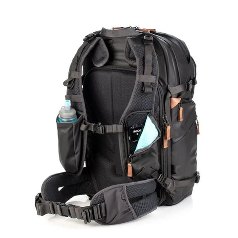 Explore V2 30 Starter Kit Camera Backpack For Travel And Outdoor Adventures with bottle holder and padded straps, black.