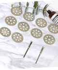Ten Piece Diamond Cutting Discs Set For Rotary Tools Ultrafine Blades with discs and rods on marble surface