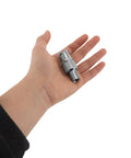 Hand holding Heavy Duty Brass Zerk Grease Coupler Adapter With Cross Fitting Nozzle Tip For Precision Hydraulic Lubrication Keeps Equipment Safe Using Standard Grease Gun Tools Easy Quick Connect Slick Design Makes Every Repair Job Way Faster Bad Ass Legit Gear.
