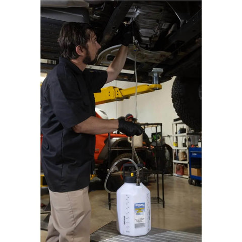 Mechanic using Pro Grade Hydraulic Brake And Clutch Pressure Bleeding System DIY Friendly With 1.2 Gallon Reservoir on vehicle