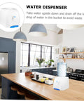 Compact Desktop Cold Water Dispenser With Easy Press Button Operation on kitchen counter in bright modern kitchen