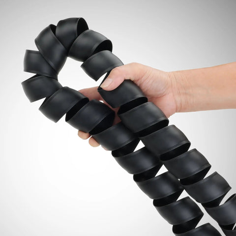 Hand holding Hydraulic Hose Protector Spiral Wrap, 2 Inch Outer Diameter, 10 Foot Length, Lightweight Protective Sleeve.