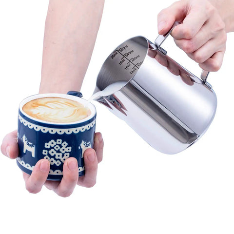 Pouring milk from Stainless Steel Milk Frothing Pitcher With Double Scale Inside For Precise Milk Froth Easy Pour Dripless Spout 12 Oz 350 Ml