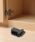 8 Pack Self Closing Push To Open Door Latches For Cabinets Black Plastic Spring Loaded Latch on wooden surface