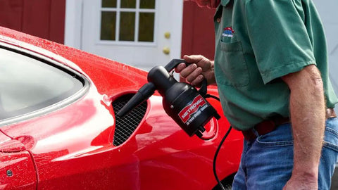 Person using Handheld Car Blower For Detailing And Cleaning, Electric Duster And Dust Buster For Cars, surfaces, 120V Quick Dust Removal