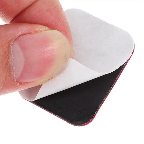 4pcs Small Furniture Adhesive Swivel Caster Wheels adhesive backing being peeled, showing easy installation feature.