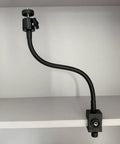 Flex Gooseneck C Clamp With 1/4-20 Threads, 360 Degree Rotation mounted on shelf, showing adjustable arm in side view