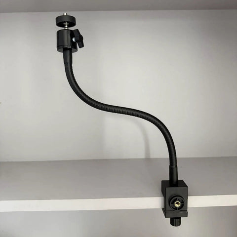 Flex Gooseneck C Clamp With 1/4-20 Threads, 360 Degree Rotation mounted on shelf, showing adjustable arm in side view