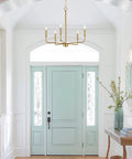 Chic 22 Inch Modern Five Light Gold Chandelier With Candle Style Sockets Open Frame Warm Brass Fixture in elegant entryway